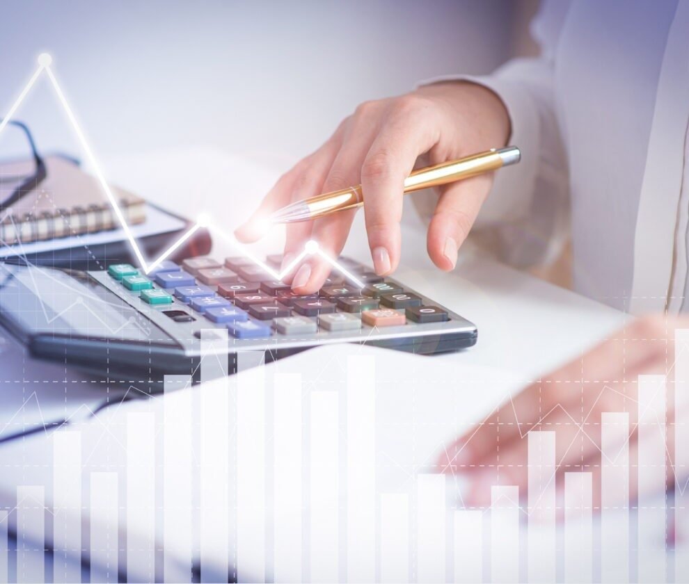 Accountant calculating profit with financial analysis graphs