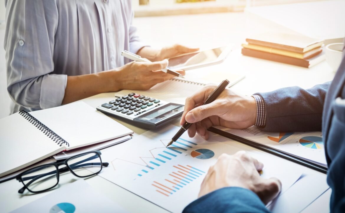 business man financial inspector and secretary making report, ca